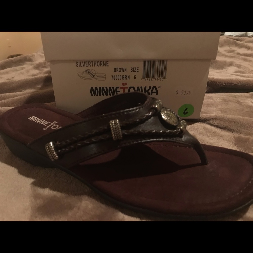 Minnetonka sandals size 6. Worn once.